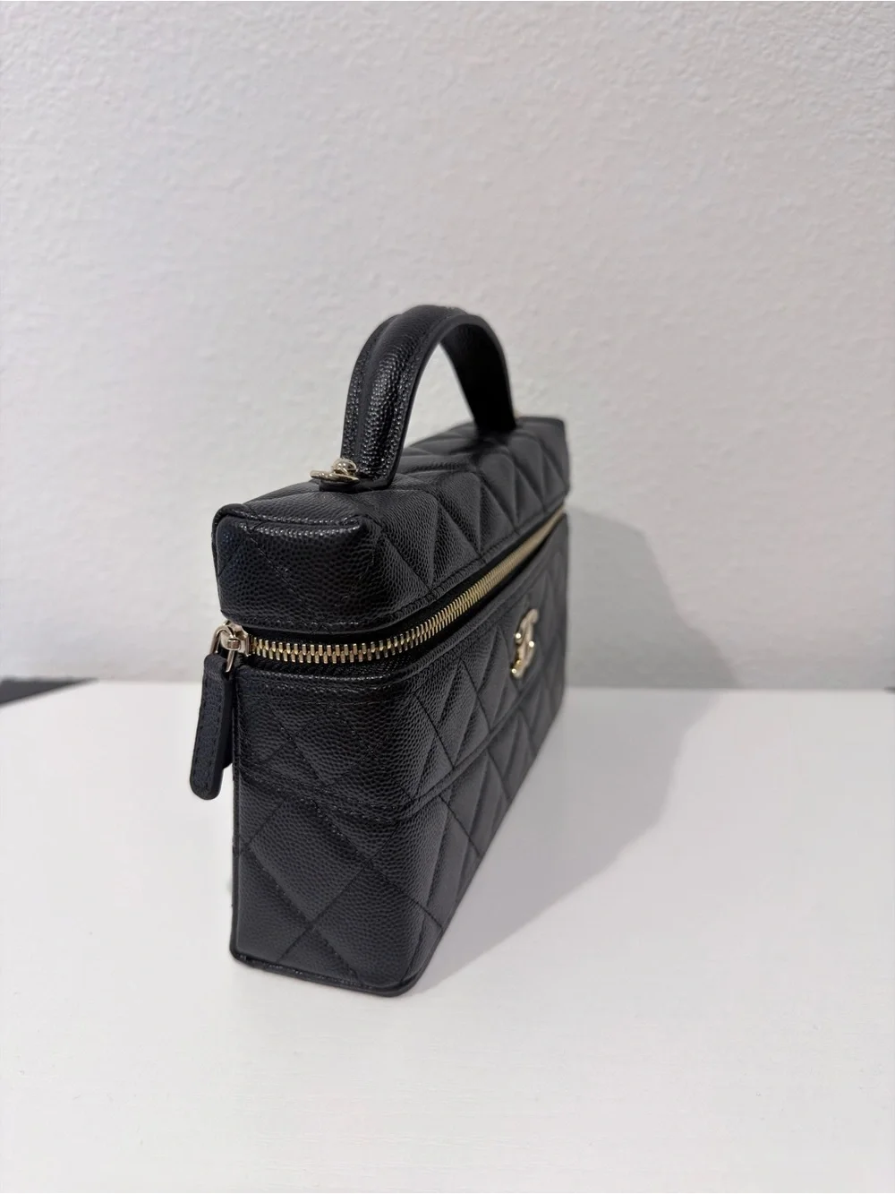 Quilted Black Top-Handle Vanity Bag
